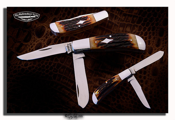2 blade Trapper with Amber Stag