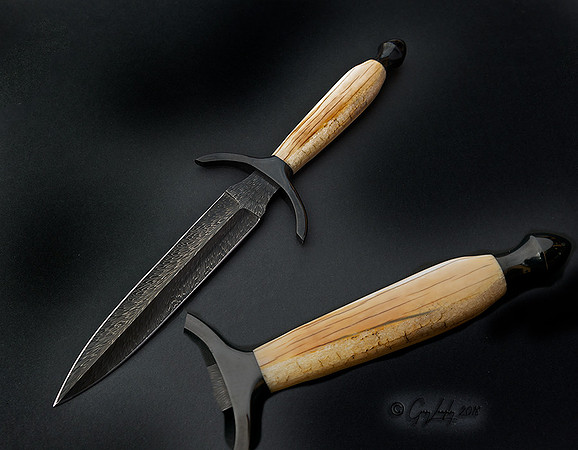 Feather Damacus  and Fossilized Walrus Tusk
