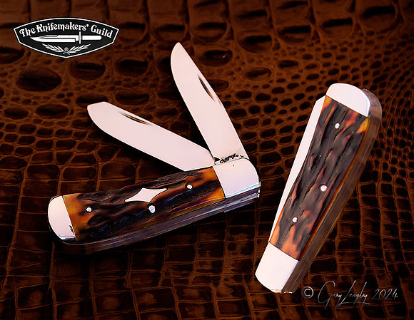 2 blade trapper slipjiont folder