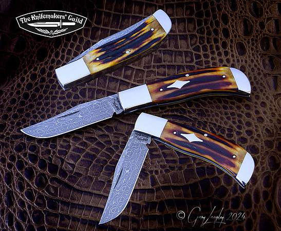 3 1/8" blade   Vegas Forge stainless Damascus. Amber Stag,